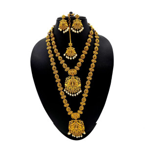 Elegant Temple Jewellery Set with Gold Finish, Ruby Accents, and Pearl Details