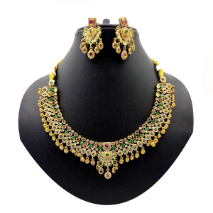 Vibrant Temple Jewellery Set with Gold Finish, Ruby & Emerald Accents